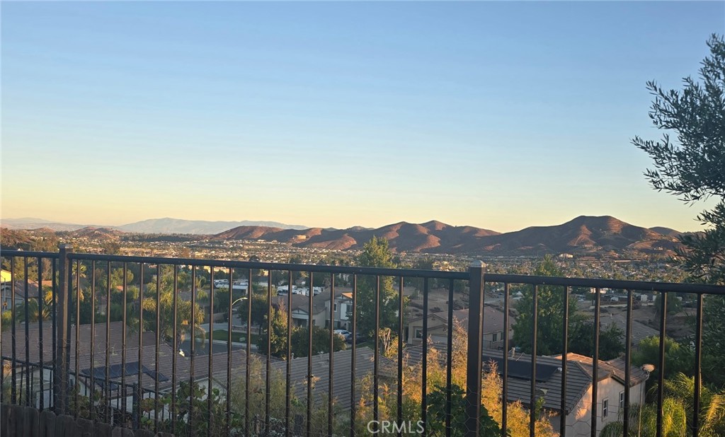 29266 Granite Ridge Court Menifee, CA 92587 - Photo 50 of 51 a view of a lake with a mountain in the background