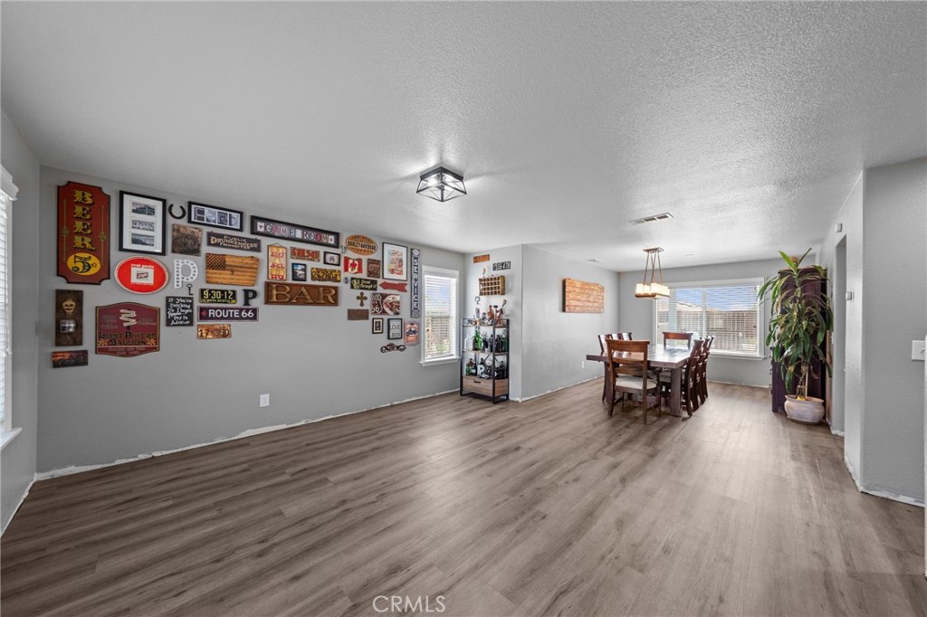 29266 Granite Ridge Court Menifee, CA 92587 - Photo 7 of 51 a view of livingroom with furniture and wooden floor