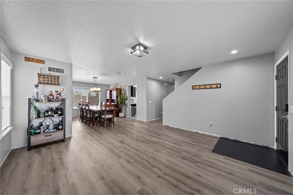 29266 Granite Ridge Court Menifee, CA 92587 - Photo 8 of 51 a view of livingroom with furniture and a ceiling fan