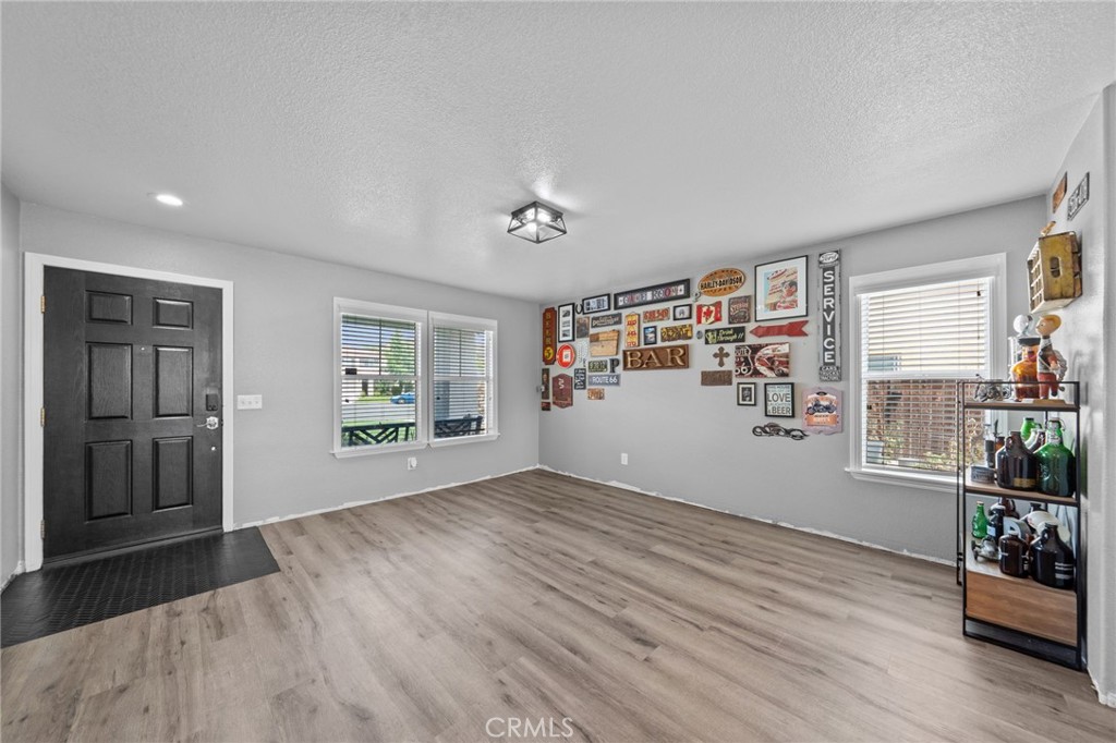 29266 Granite Ridge Court Menifee, CA 92587 - Photo 10 of 51 an empty room with windows and closet