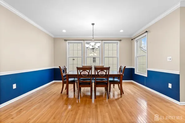 a bathroom with a sink mirror toilet and vanity