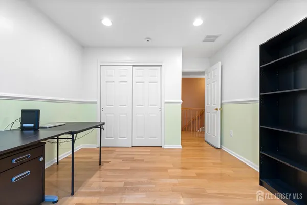 a view of a brick house with wooden floor