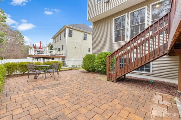 an aerial view of houses with outdoor space
