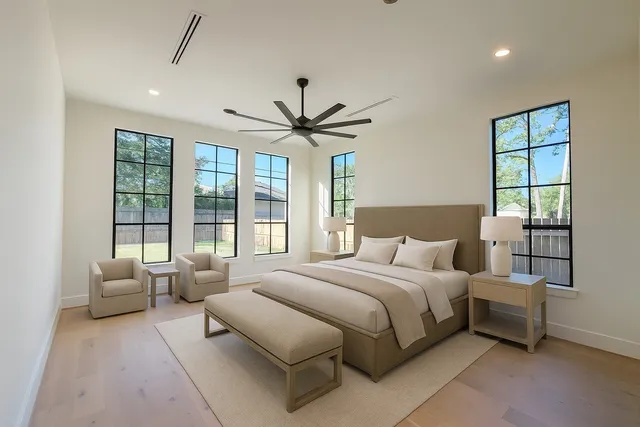 a view of a bathroom with 2 sink tub and a mirror