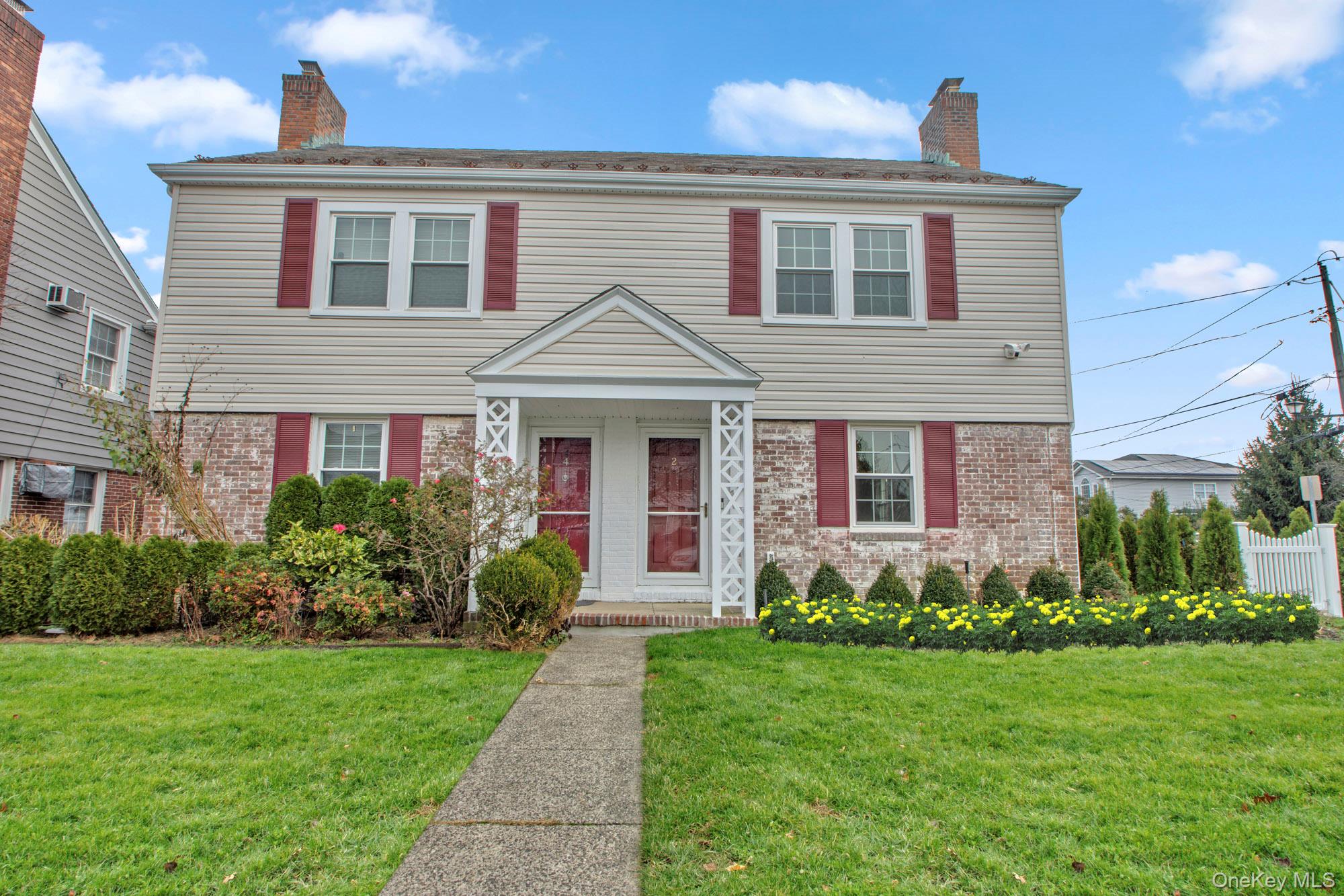 2 Bayview Court Manhasset, NY 11030 - Photo 21 of 21 Colonial inspired home with brick siding and a chimney