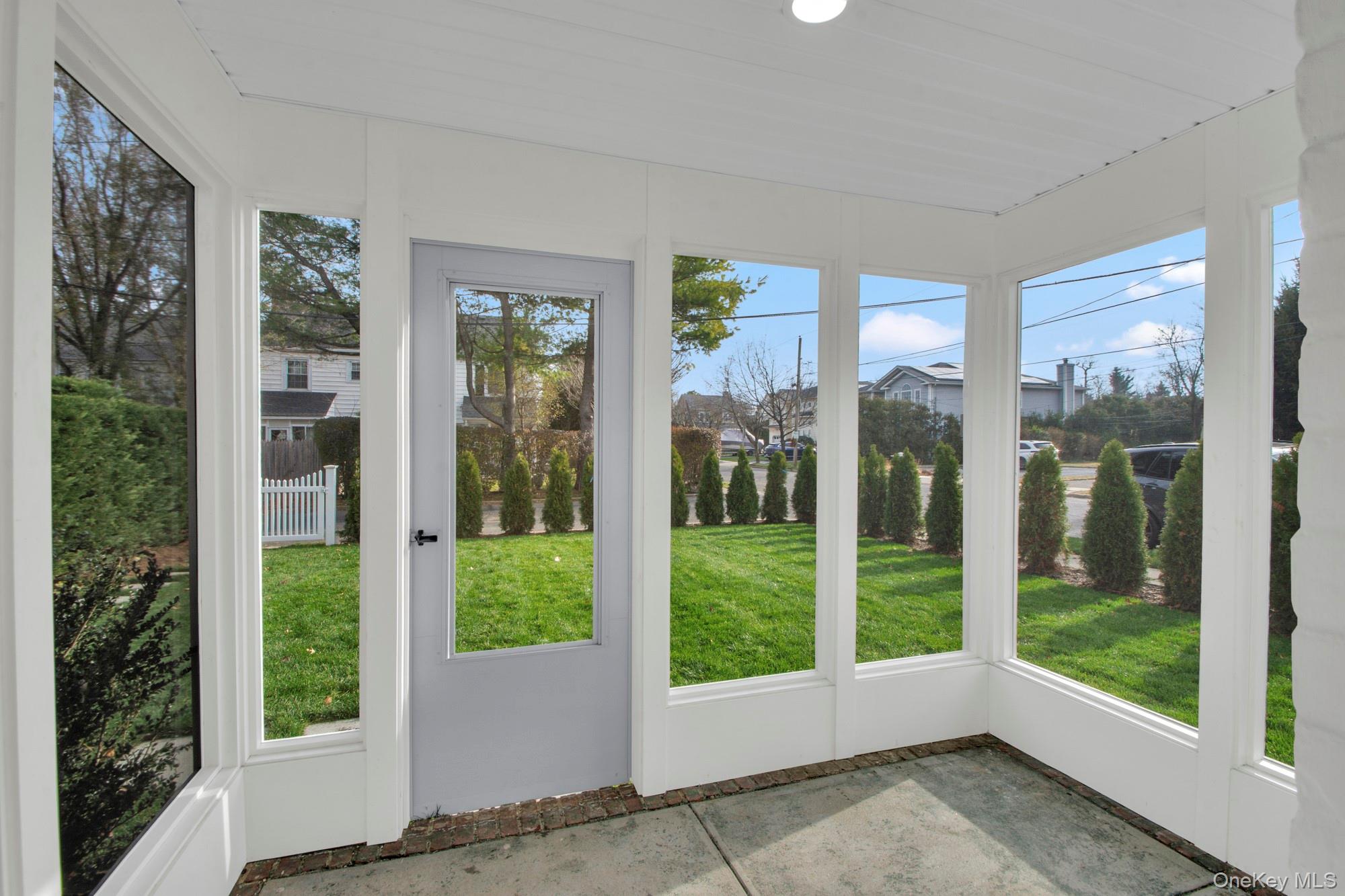 2 Bayview Court Manhasset, NY 11030 - Photo 10 of 21 Sunroom featuring plenty of natural light
