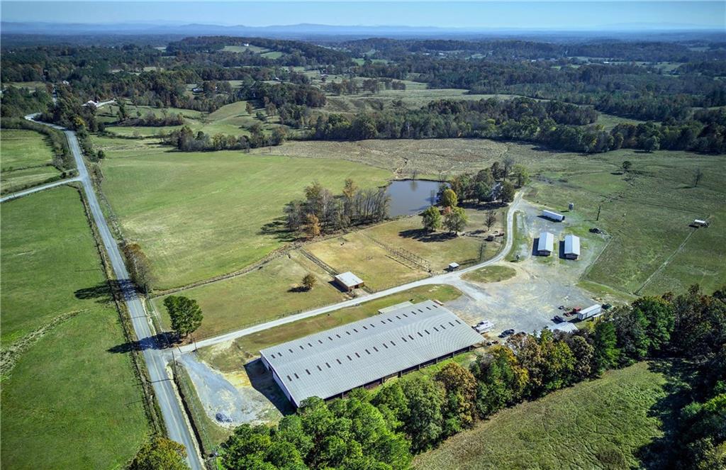 486 County Line Road Resaca, GA 30735 - Photo 33 of 33 an aerial view of a house with outdoor space