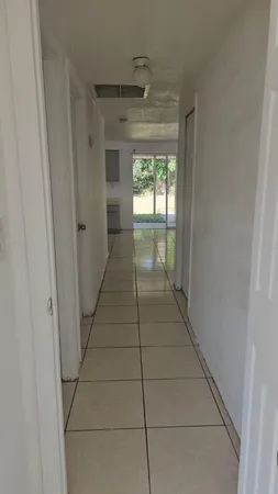 a bathroom with a glass door shower
