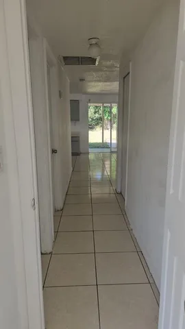 a bathroom with a glass door shower