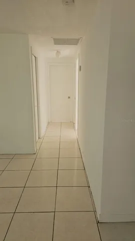 a view of hallway with a window