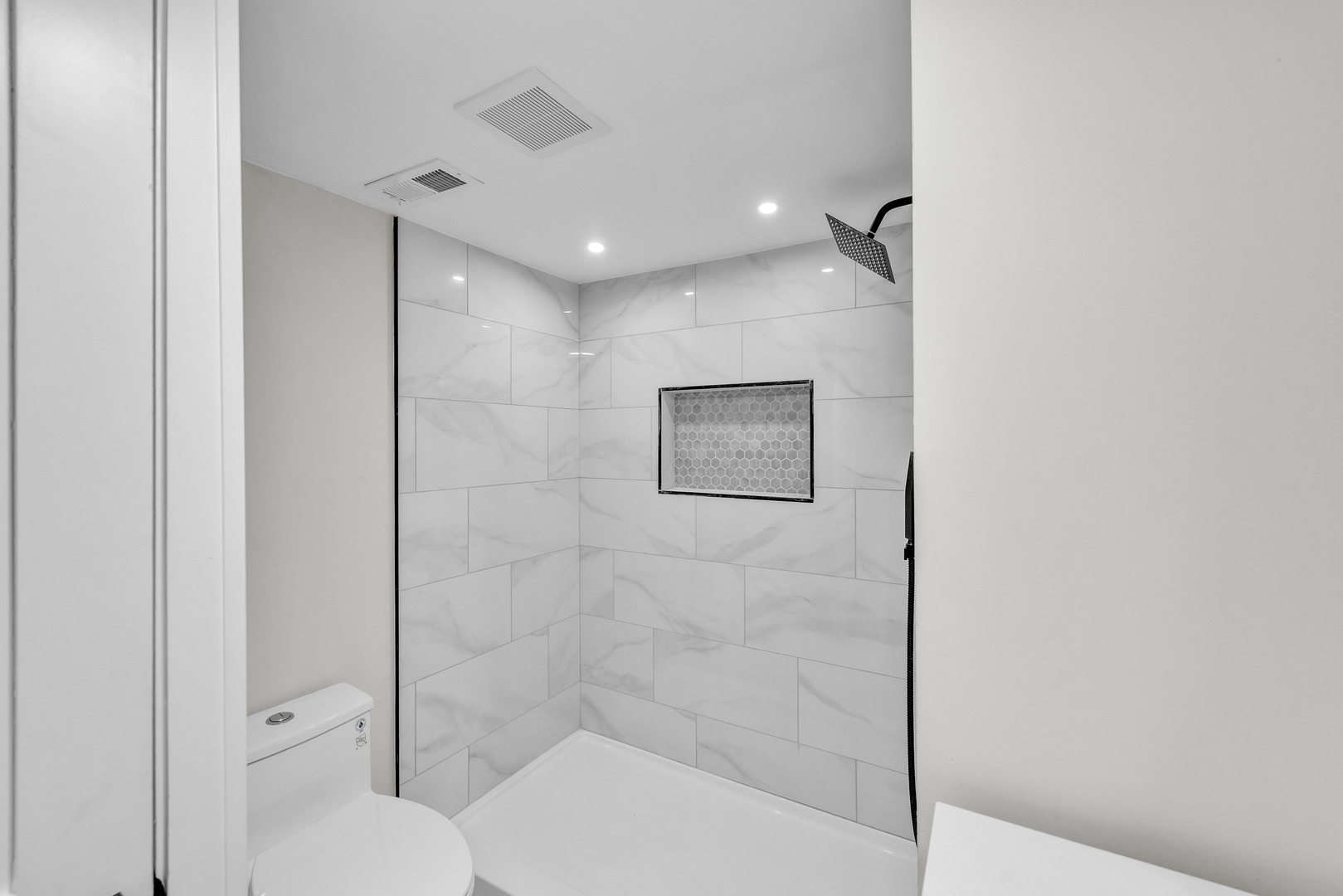 5331 West 53rd Place Chicago, IL 60638 - Photo 18 of 28 a bathroom with a shower and toilet