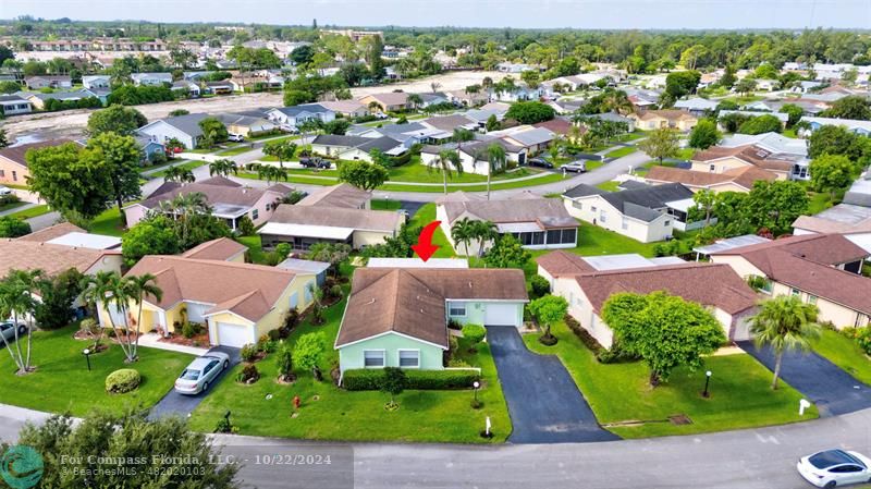 7359 Pine Park Drive North Lake Worth, FL 33467 - Photo 42 of 47 an aerial view of residential houses with outdoor space and street view