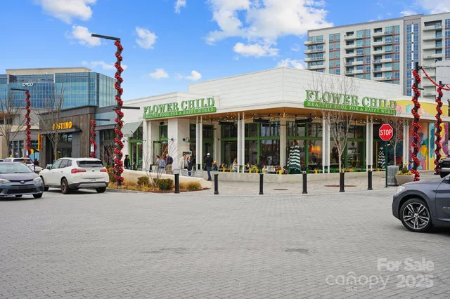 a view of a building with sitting area and porch