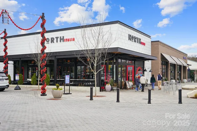 a view of street with shops