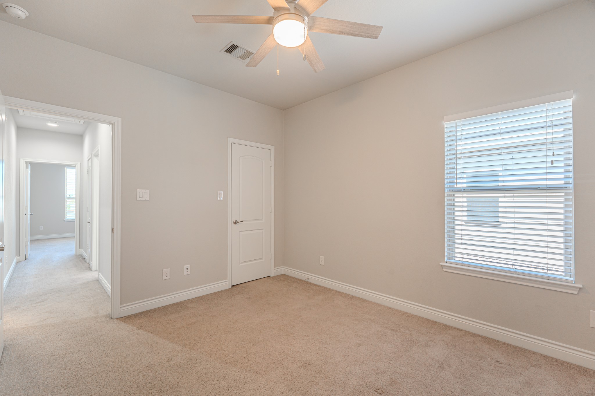 27918 Madison Bend Drive Spring, TX 77386 - Photo 40 of 50 wooden floor in an empty room with a window