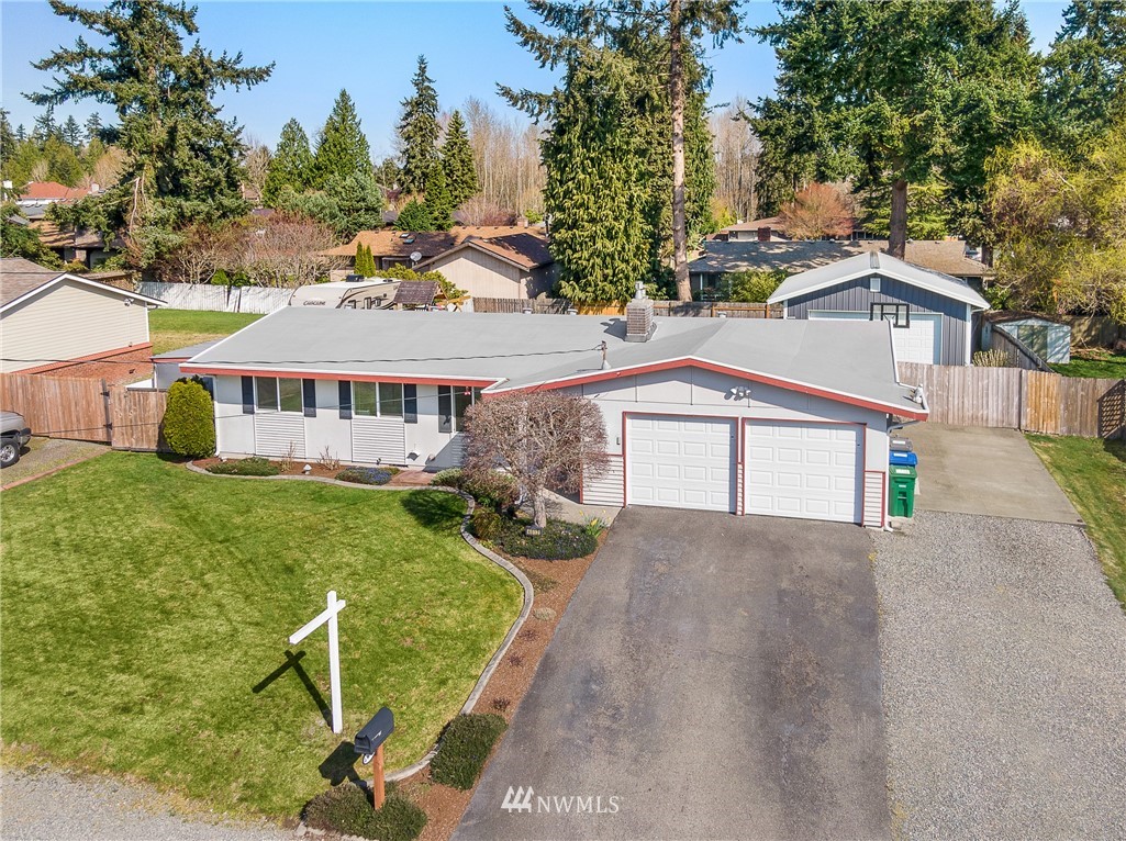 4612 Northeast 23rd Street Renton, WA 98059 - Photo 2 of 24 a view of a house with a yard and sitting area