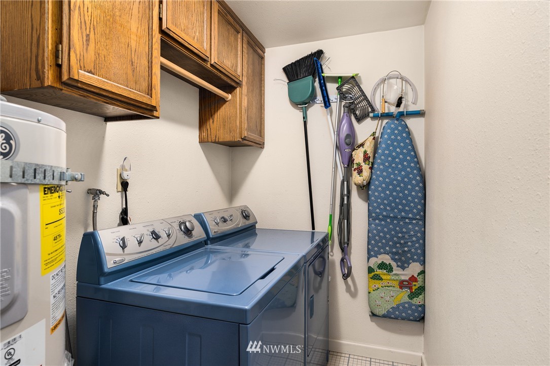 4612 Northeast 23rd Street Renton, WA 98059 - Photo 15 of 24 a view of storage and utility room with a sink