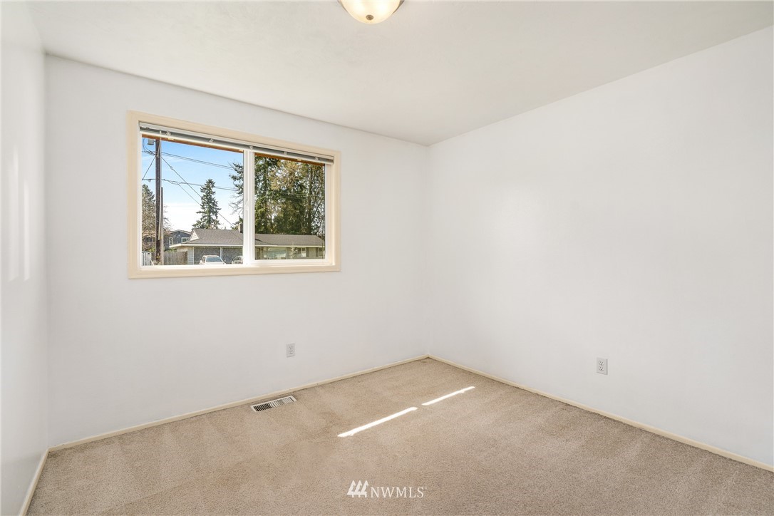 4612 Northeast 23rd Street Renton, WA 98059 - Photo 18 of 24 an empty room with a window