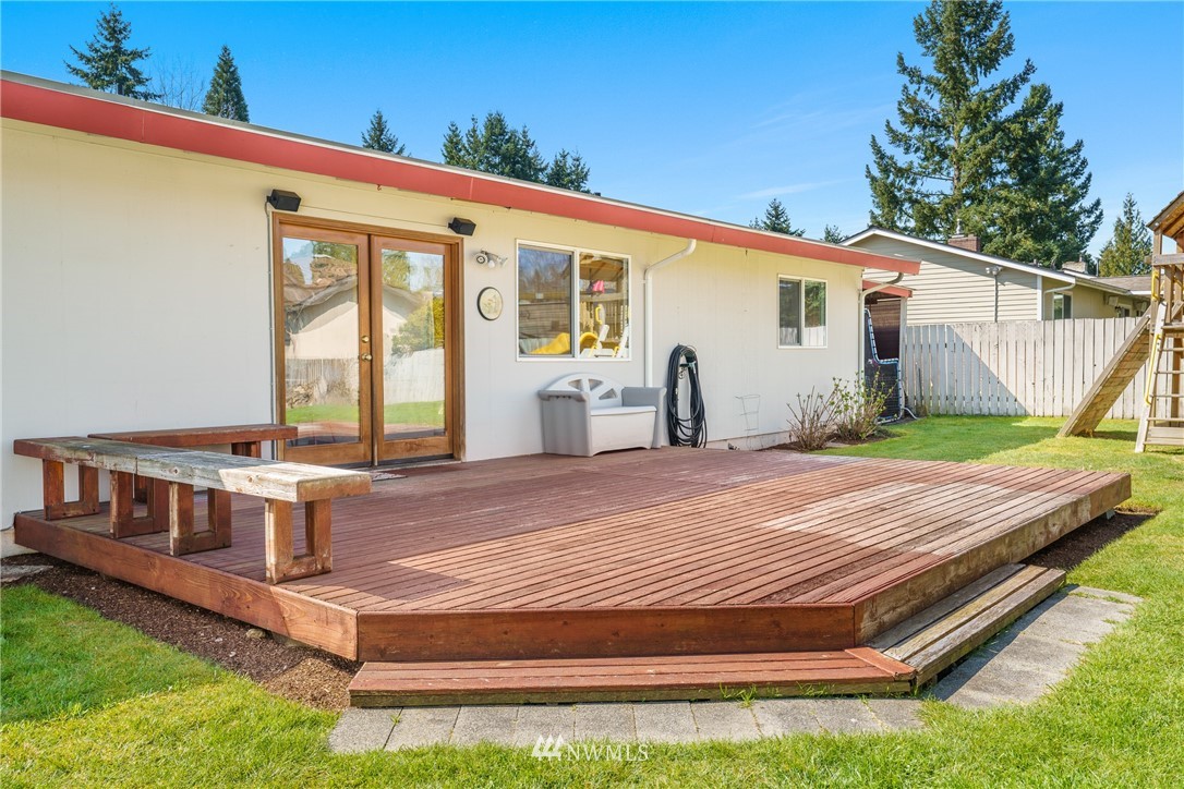 4612 Northeast 23rd Street Renton, WA 98059 - Photo 22 of 24 a view of a house with backyard and sitting area