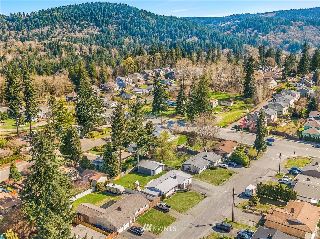 4612 Northeast 23rd Street Renton, WA 98059 - Photo 7 of 24 an aerial view of residential house with outdoor space and lake view