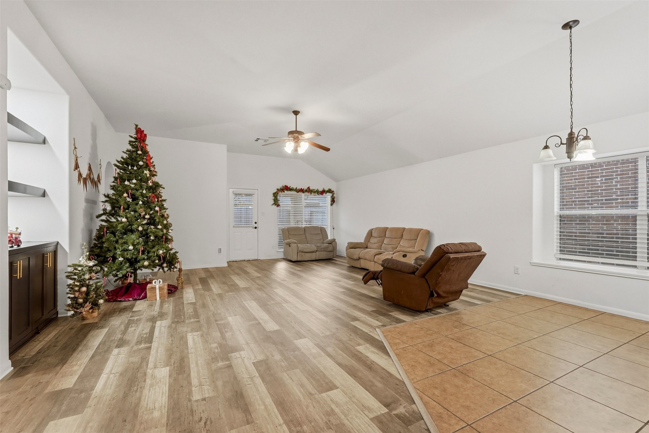 16518 Dover Mills Drive Spring, TX 77379 - Photo 12 of 28 a living room with furniture and flowers