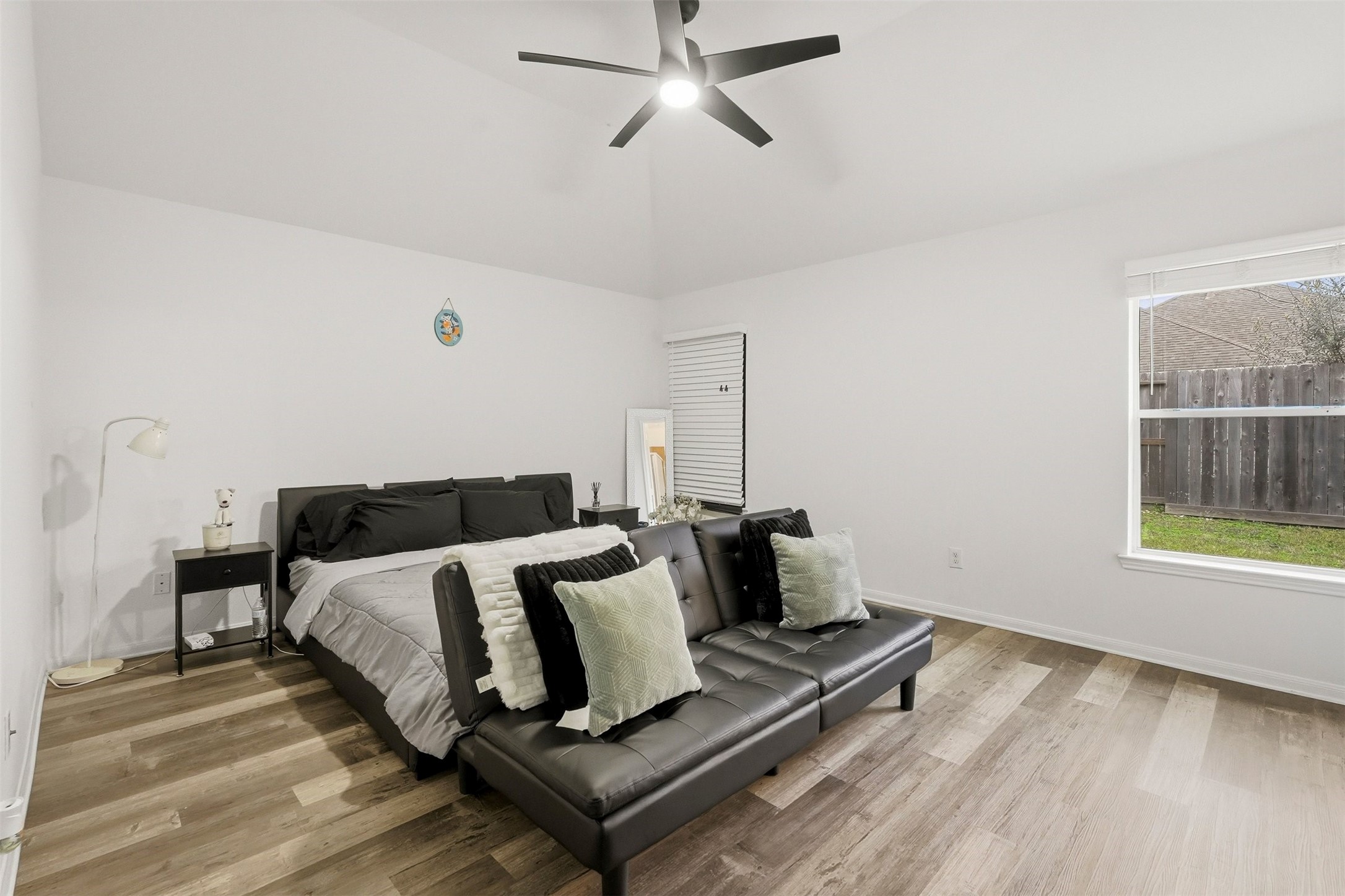 16518 Dover Mills Drive Spring, TX 77379 - Photo 17 of 28 a living room with a bed furniture and a window