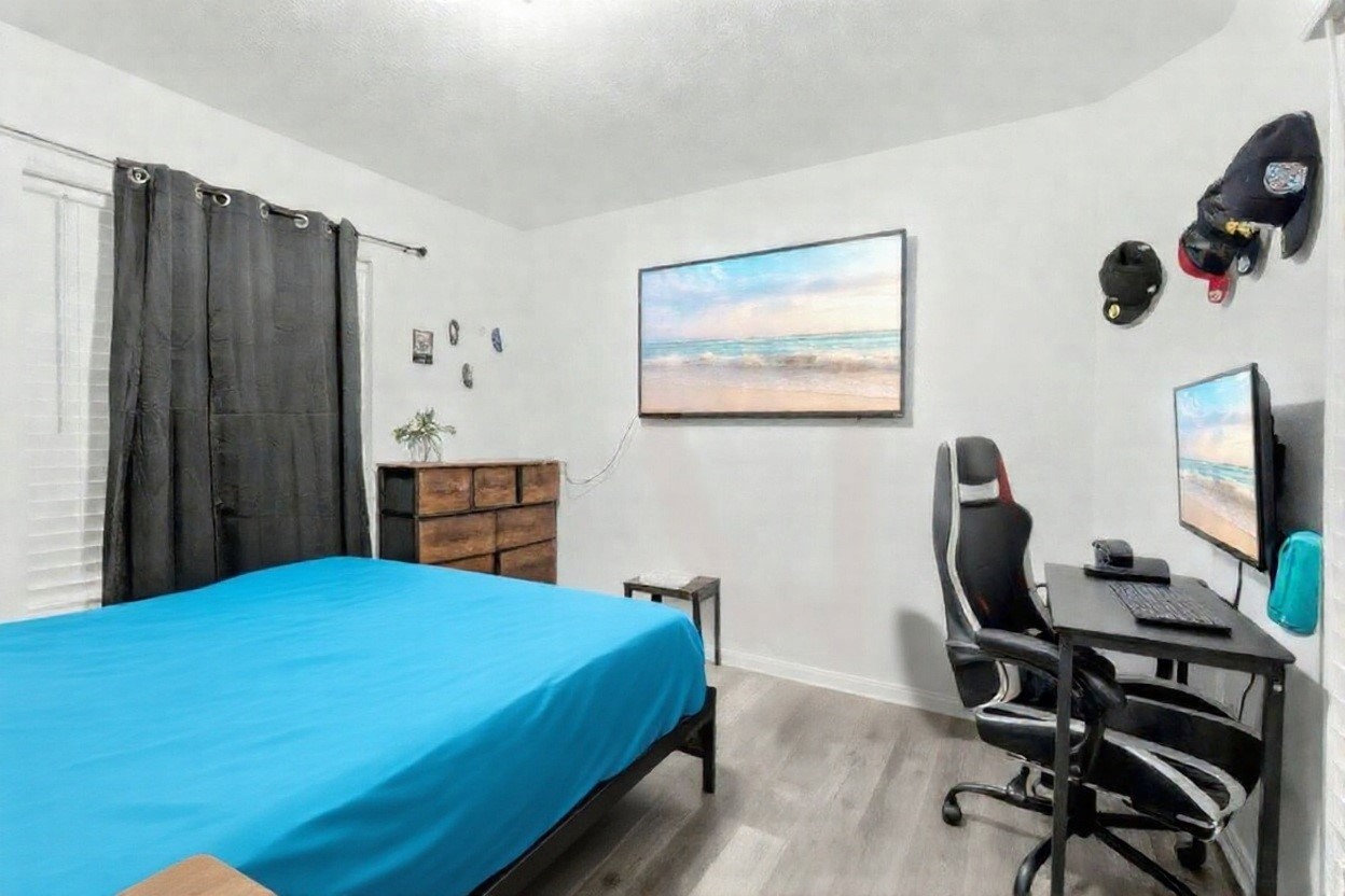 16518 Dover Mills Drive Spring, TX 77379 - Photo 23 of 28 a bedroom with a workspace