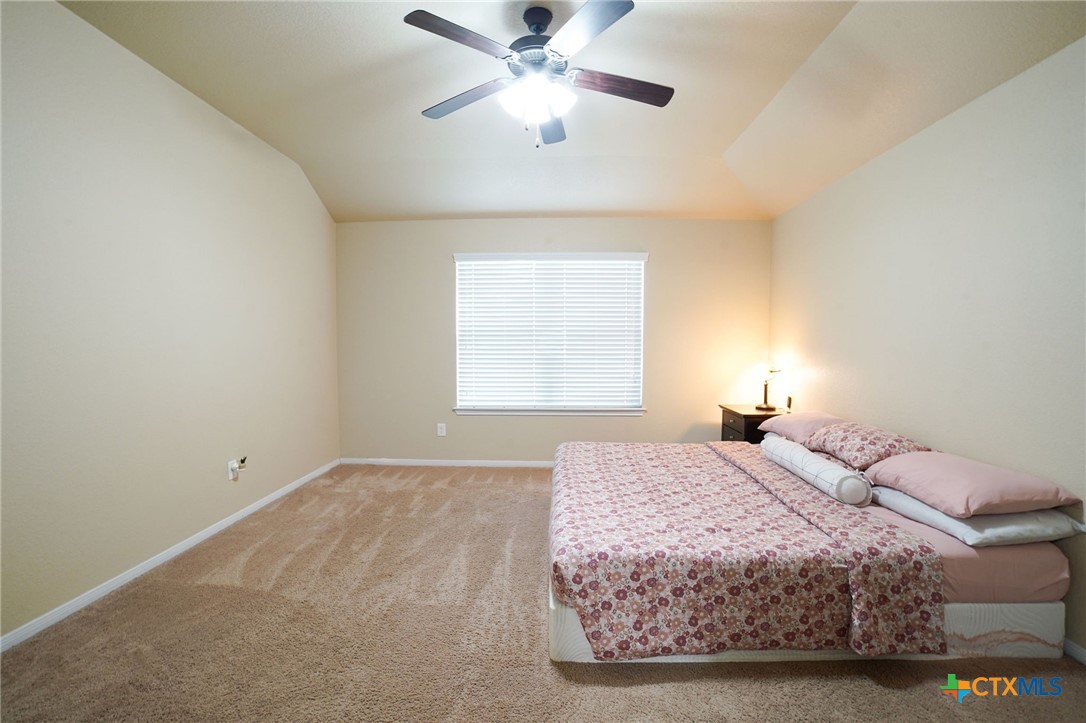 3422 Doss Street Copperas Cove, TX 76522 - Photo 14 of 29 a bedroom with a bed and window