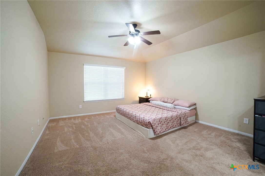 3422 Doss Street Copperas Cove, TX 76522 - Photo 15 of 29 a bedroom with a bed and window
