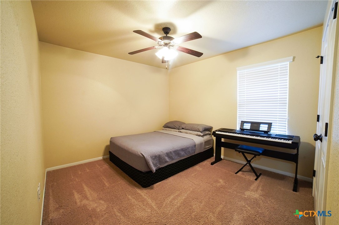 3422 Doss Street Copperas Cove, TX 76522 - Photo 20 of 29 a bedroom with a bed and a window