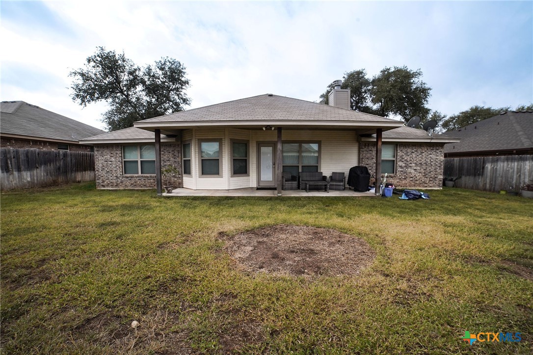 3422 Doss Street Copperas Cove, TX 76522 - Photo 27 of 29 a front view of a house with garden