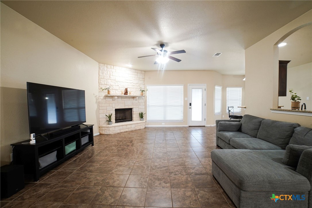 3422 Doss Street Copperas Cove, TX 76522 - Photo 5 of 29 a living room with furniture and a flat screen tv