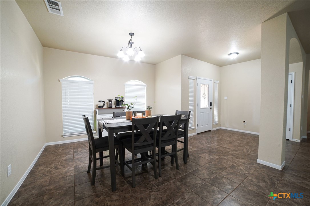 3422 Doss Street Copperas Cove, TX 76522 - Photo 9 of 29 a view of a dining room with furniture