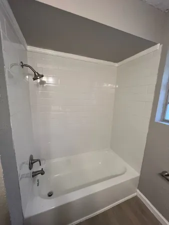 a bathroom with a bathtub
