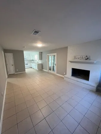 a view of a livingroom with a fireplace