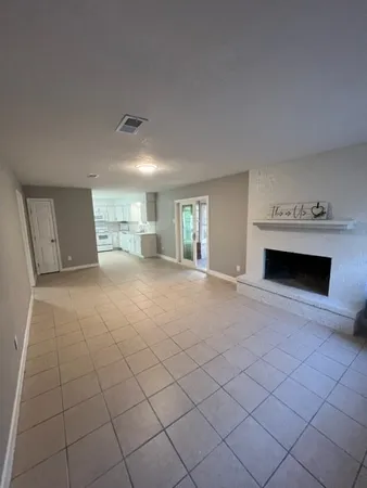 a view of a livingroom with a fireplace