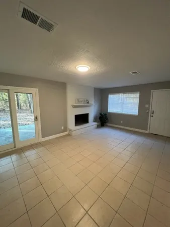 an empty room with windows