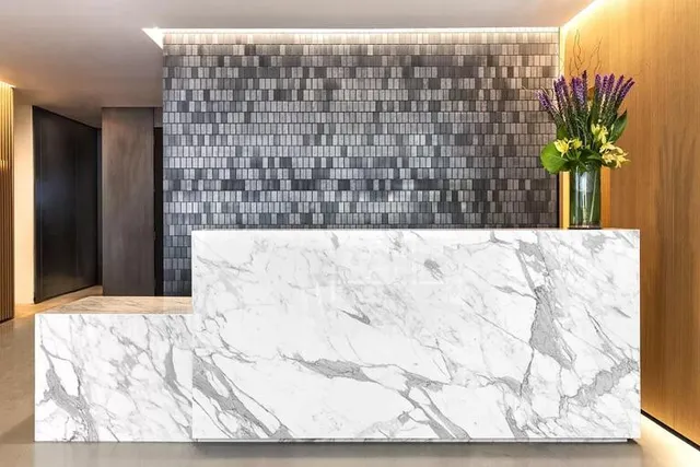 a bathroom with a double vanity sink and mirror