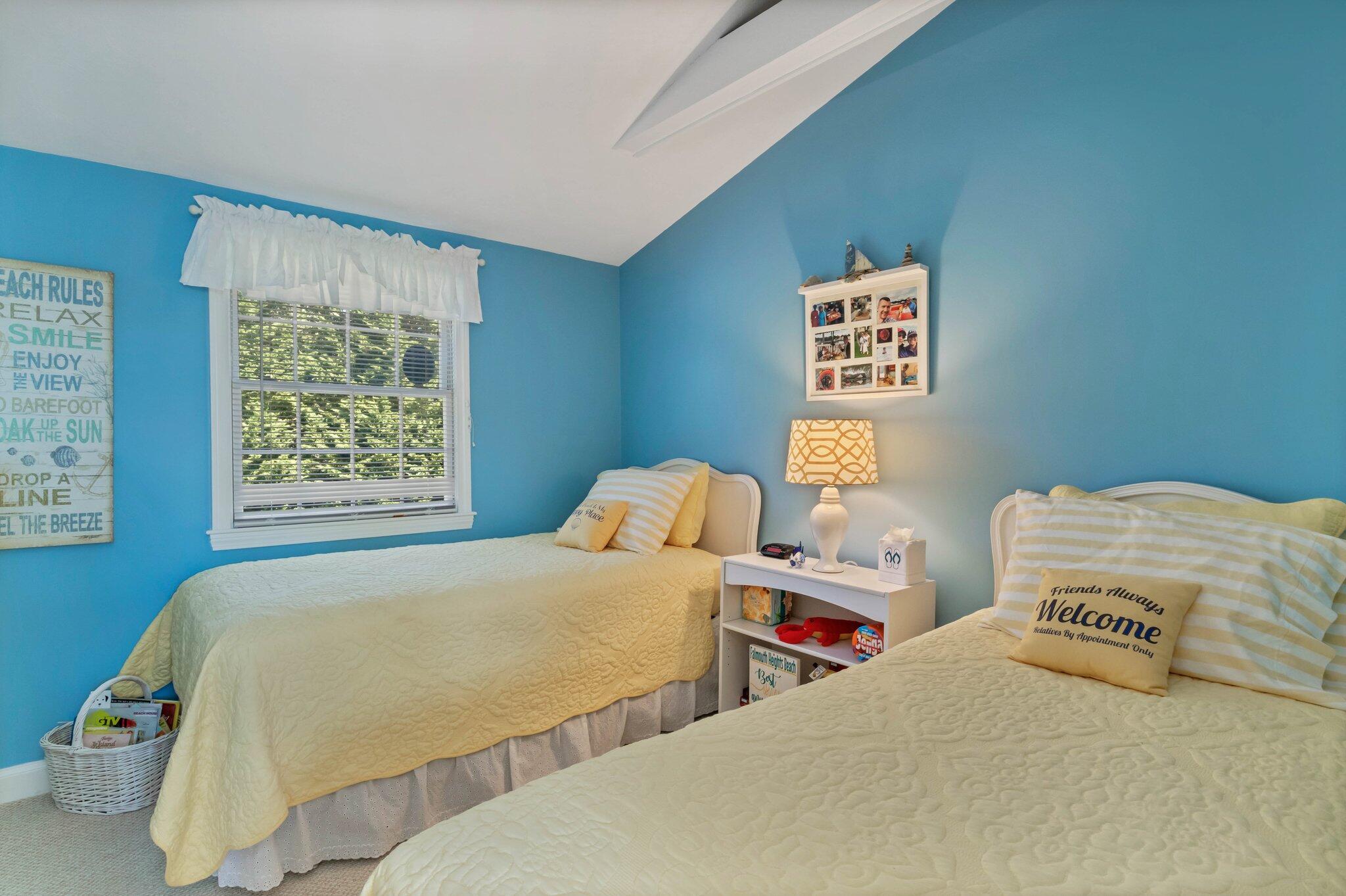 153 Jericho Path, Unit 8U Falmouth, MA 02540 - Photo 21 of 52 a bedroom with two beds and a window