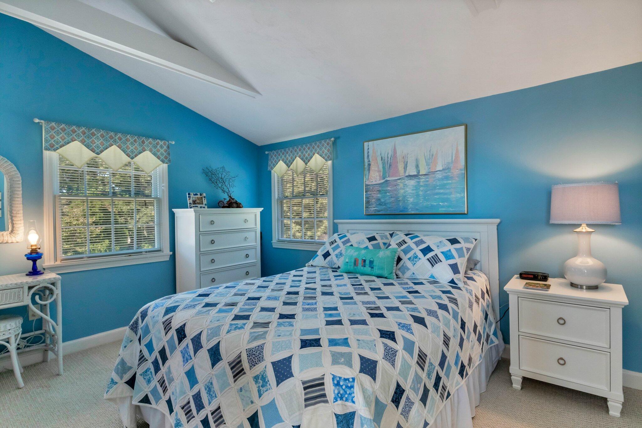 153 Jericho Path, Unit 8U Falmouth, MA 02540 - Photo 22 of 52 a bedroom with a bed and a window