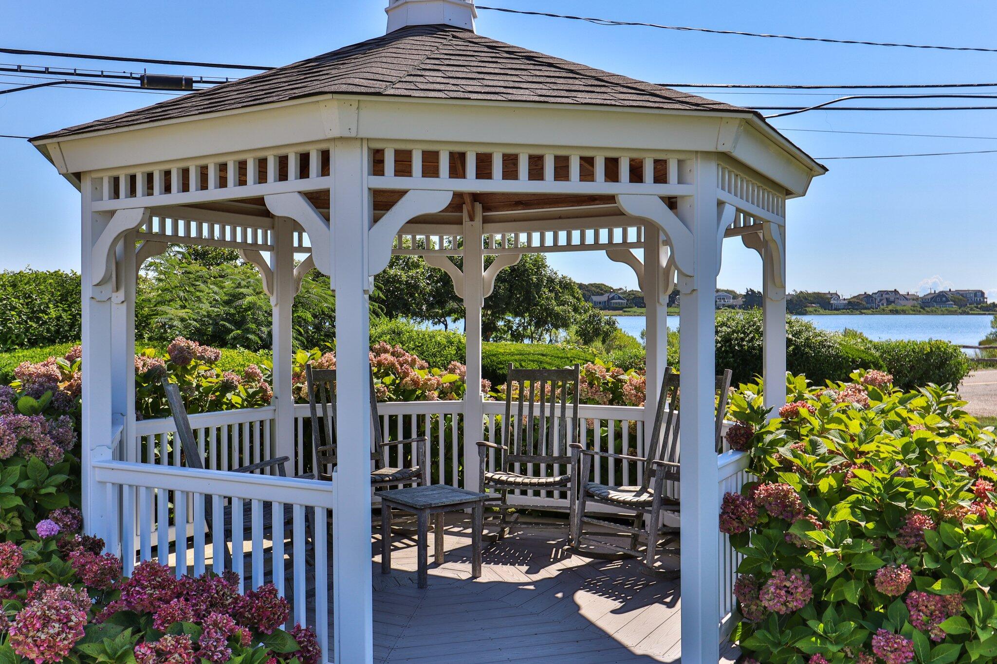153 Jericho Path, Unit 8U Falmouth, MA 02540 - Photo 32 of 52 a front view of a house with a porch