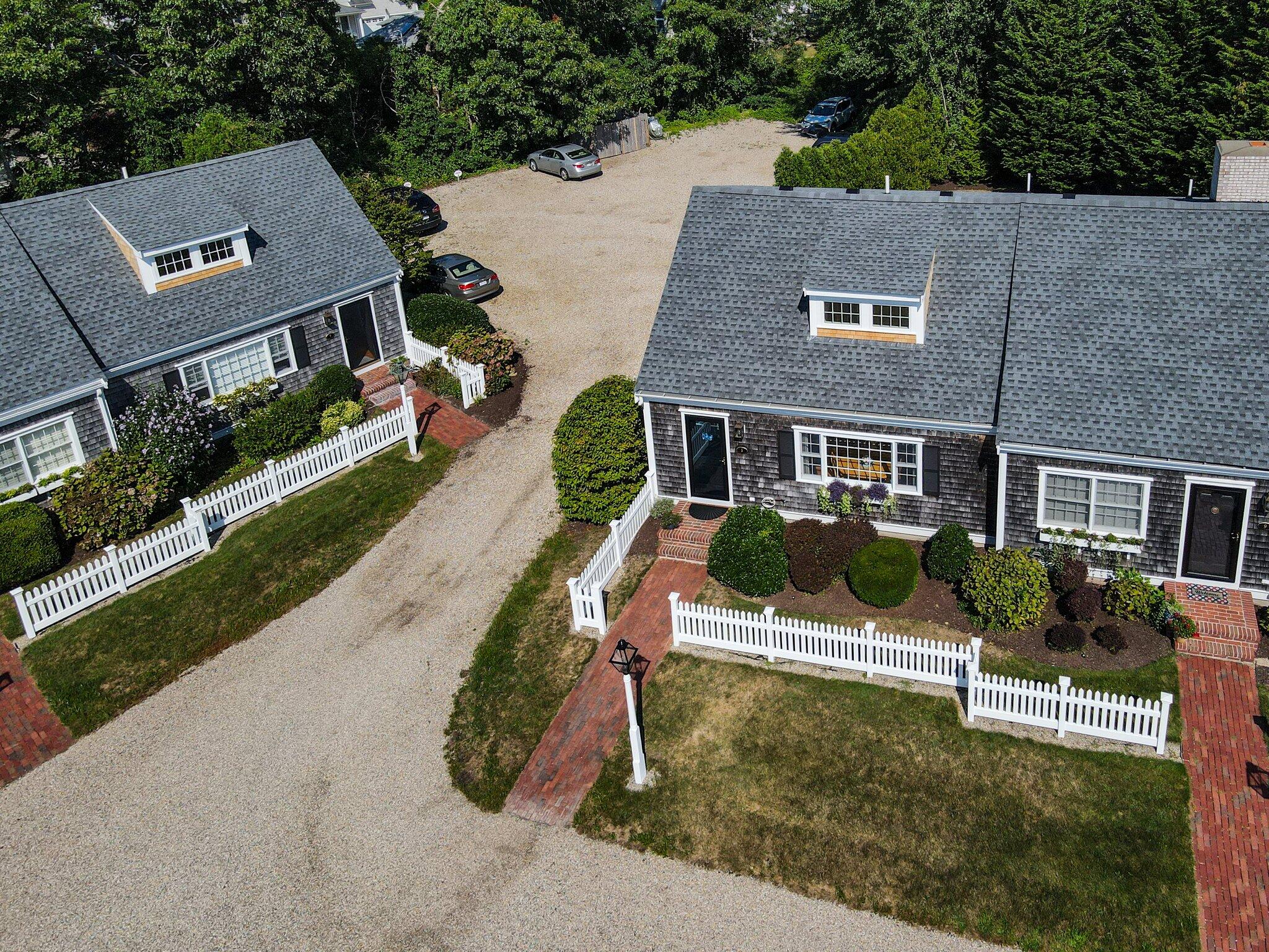 153 Jericho Path, Unit 8U Falmouth, MA 02540 - Photo 33 of 52 an aerial view of a house with garden