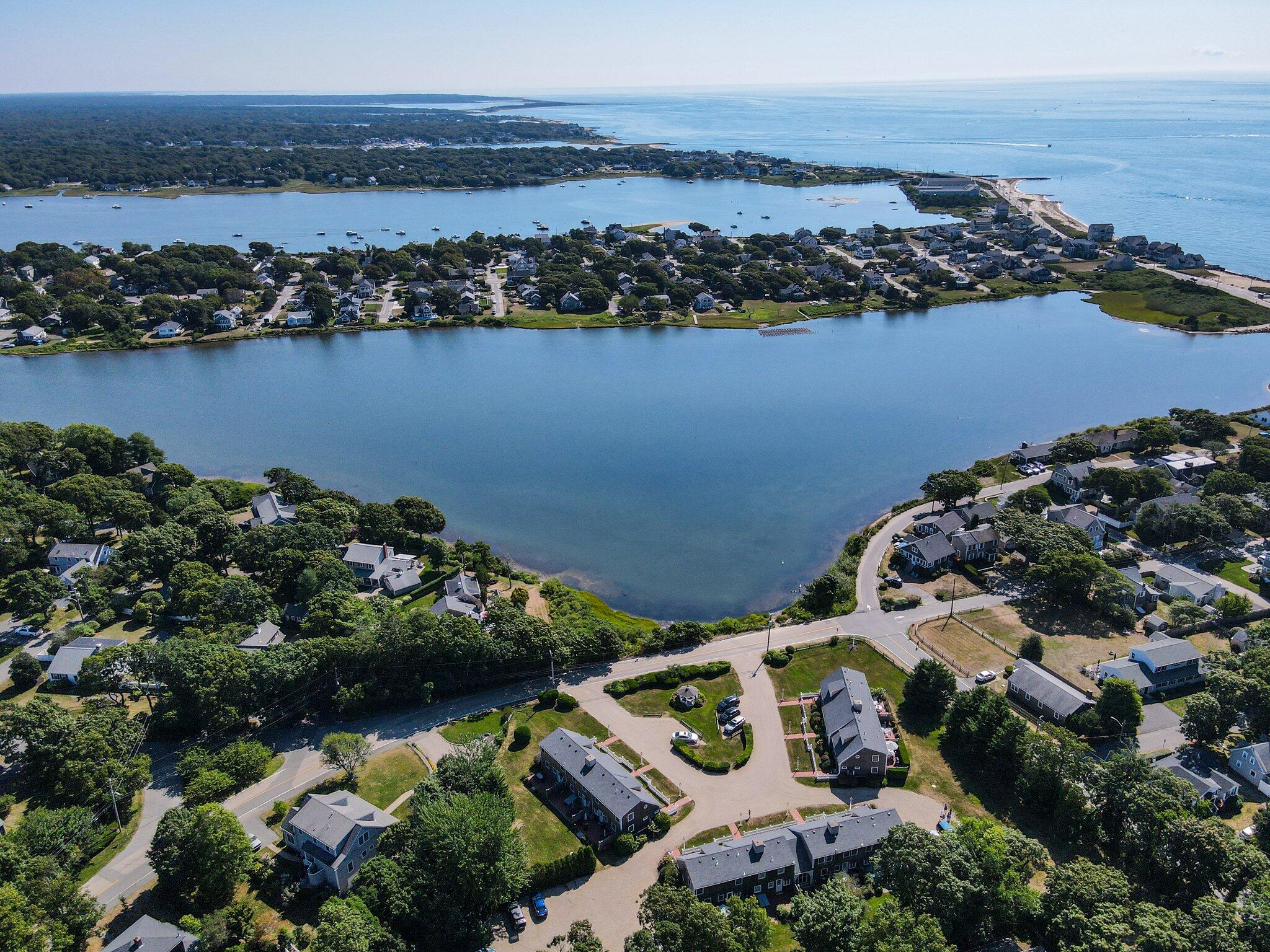 153 Jericho Path, Unit 8U Falmouth, MA 02540 - Photo 41 of 52 an aerial view of a house with a lake view