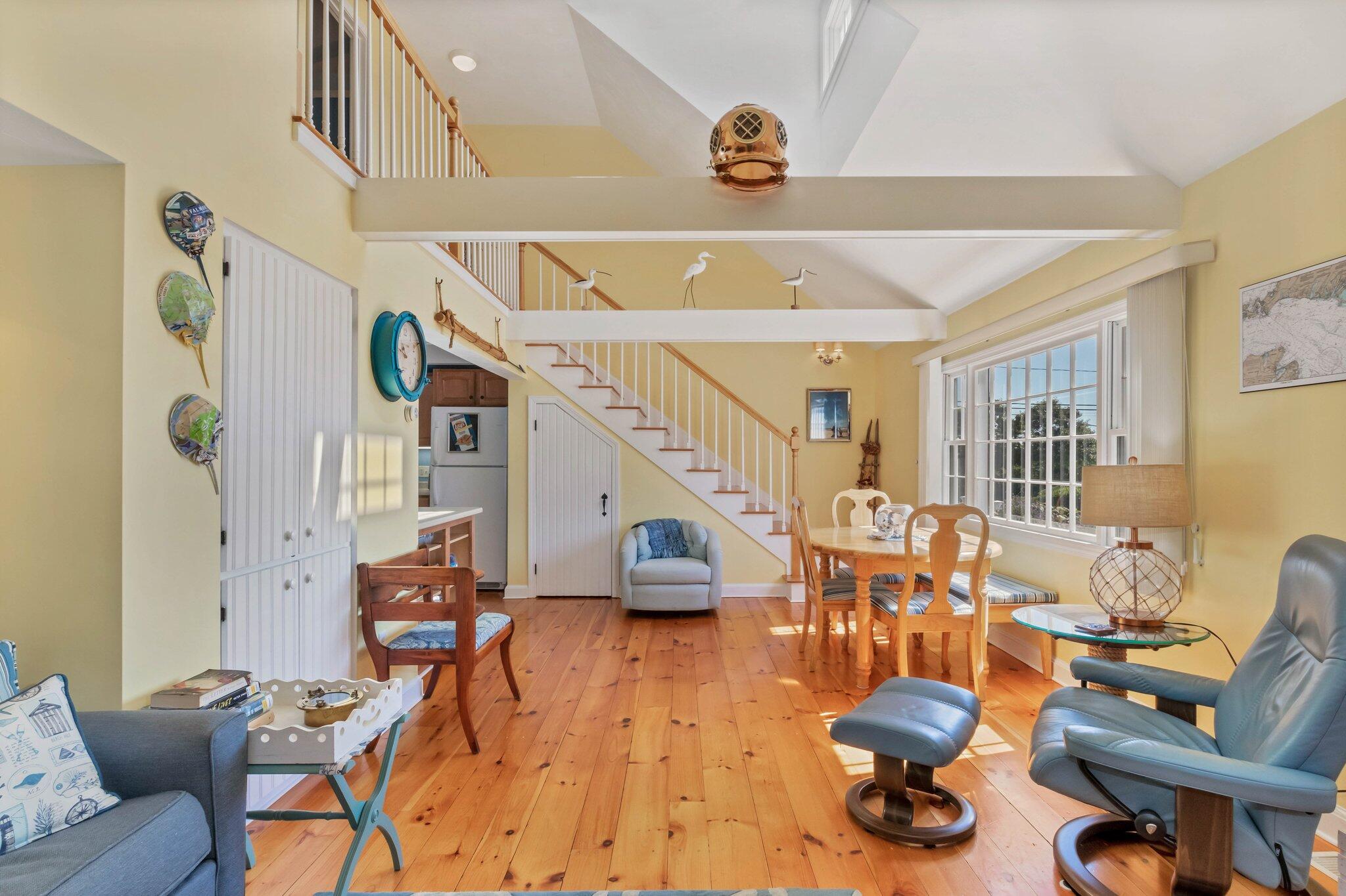153 Jericho Path, Unit 8U Falmouth, MA 02540 - Photo 7 of 52 a living room with furniture and a wooden floor