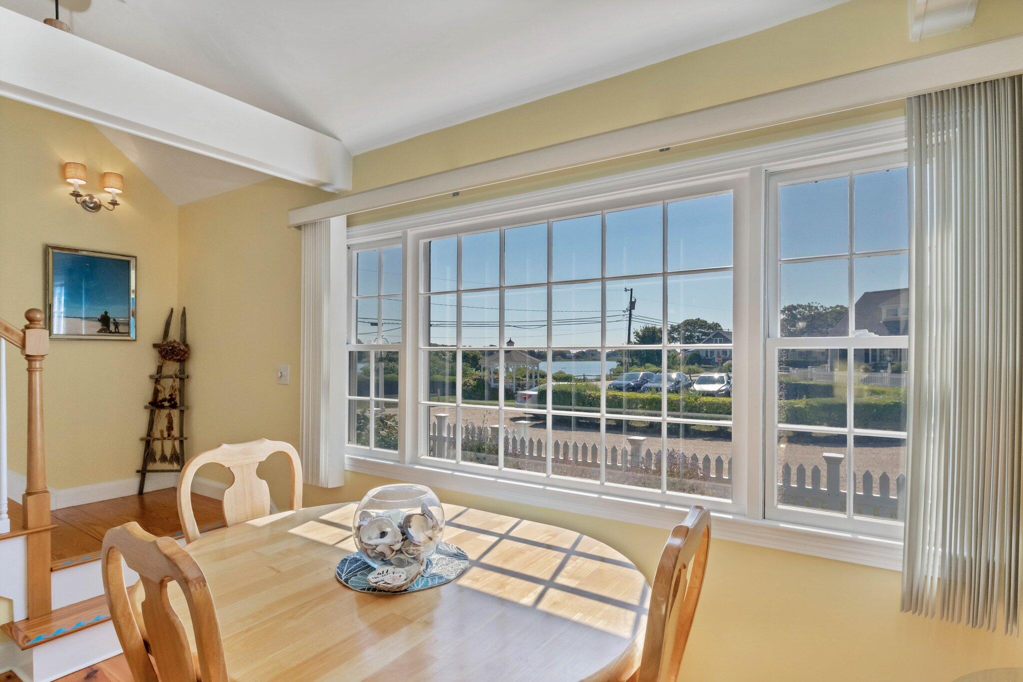 153 Jericho Path, Unit 8U Falmouth, MA 02540 - Photo 8 of 52 a living room with furniture and a large window