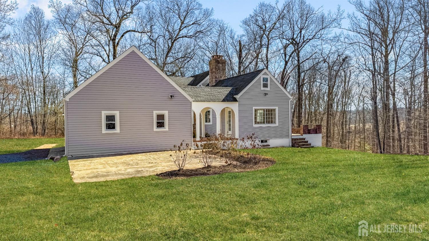 3 Brady Drive Gladstone, NJ 07934 - Photo 14 of 34 a front view of a house with garden