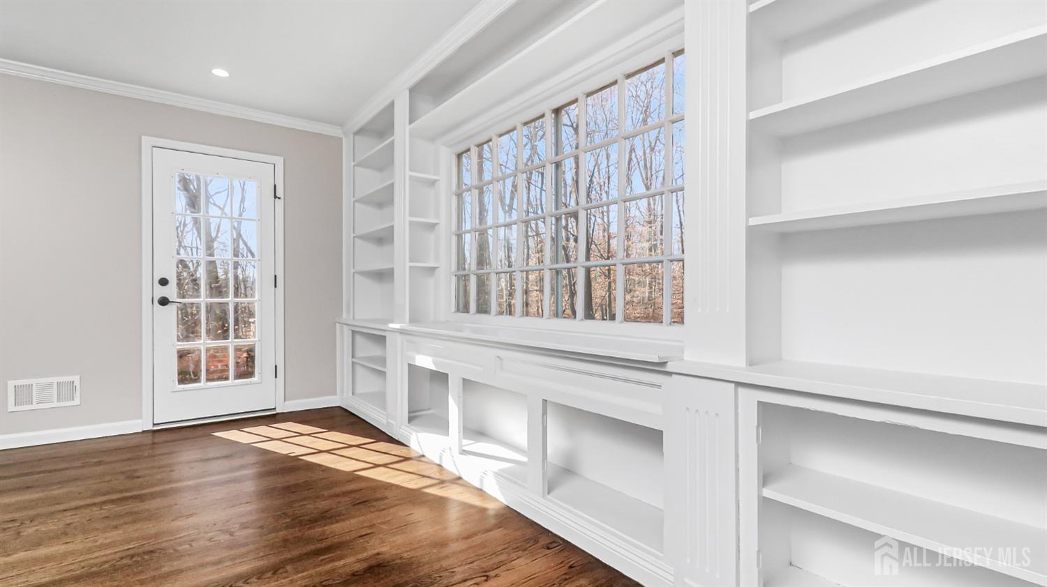 3 Brady Drive Gladstone, NJ 07934 - Photo 25 of 34 a view of an empty room with wooden floor and a window