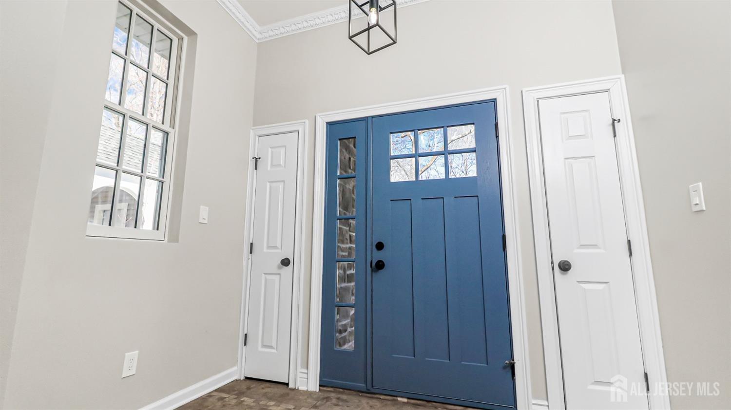 3 Brady Drive Gladstone, NJ 07934 - Photo 4 of 34 an empty room with windows