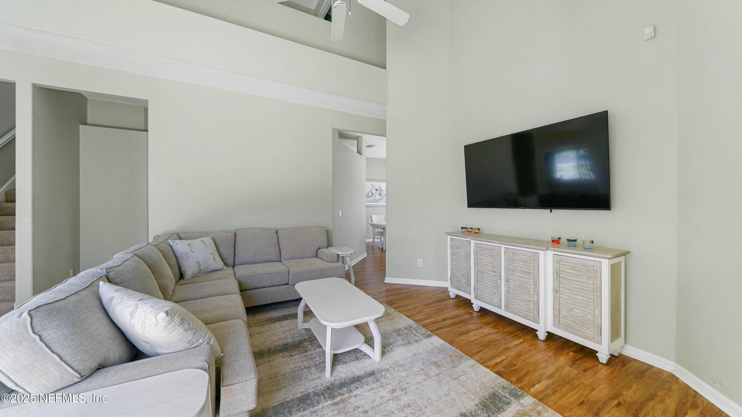 165 Cedar Ridge Circle St. Augustine, FL 32080 - Photo 14 of 46 a living room with furniture and a flat screen tv