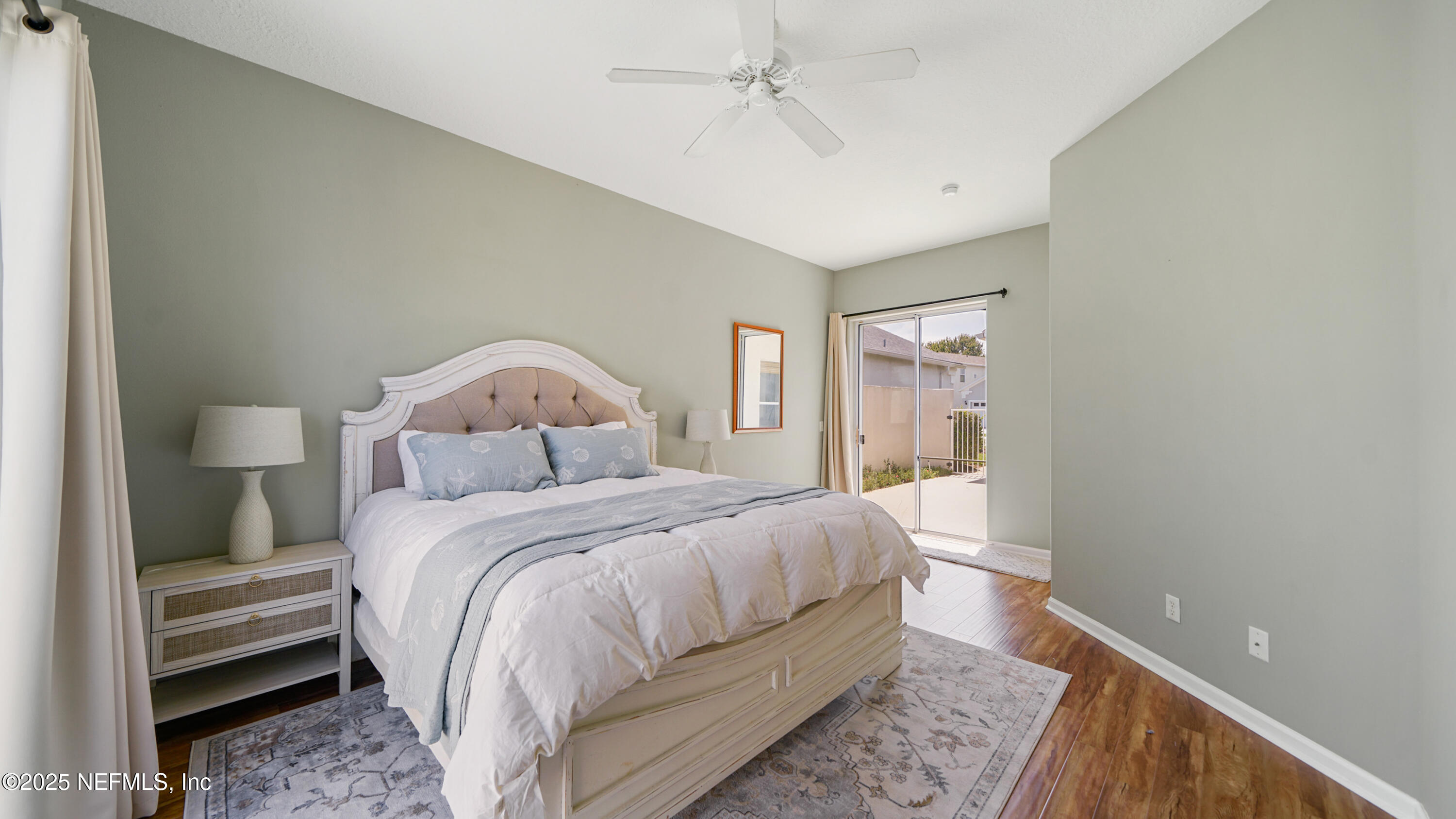 165 Cedar Ridge Circle St. Augustine, FL 32080 - Photo 16 of 46 a bedroom with a bed and a window